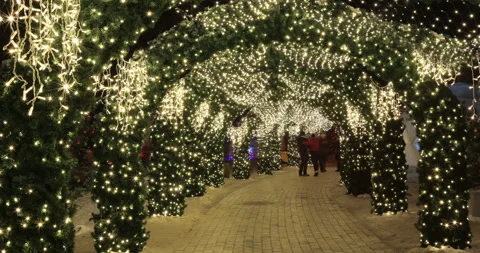 4k Time Lapse with  People Walking through Christmas Tunnel. Beautiful Christ Stock Footage 117910831
