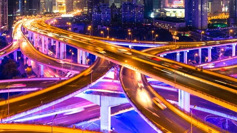 4K Time-lapse photography - Car driving on an elevated road at night (zoom) Video stock 113813341