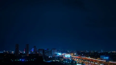 4K Time lapse raining storm lightning in cityscape at night Stock Footage 109125977