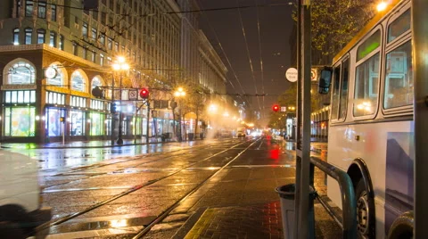 4k time lapse of a rainy San Francisco morning at Market st. Stockton and Ellis Stock Footage 46332946