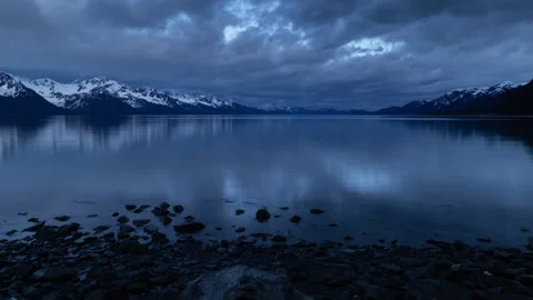 4K time lapse of Resurrection Bay snowy mountains in Seward, Alaska at sunset Stock Footage 242933147