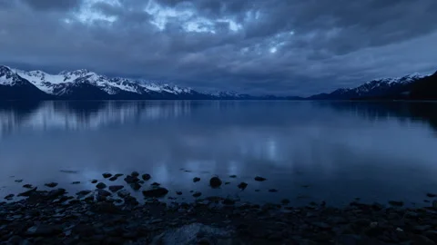 4K time lapse of Resurrection Bay snowy mountains in Seward, Alaska at sunset Stock Footage 242961698
