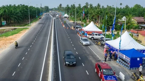 4K Time lapse of road traffic over 14th General Election of Malaysia Stock Footage 89681378