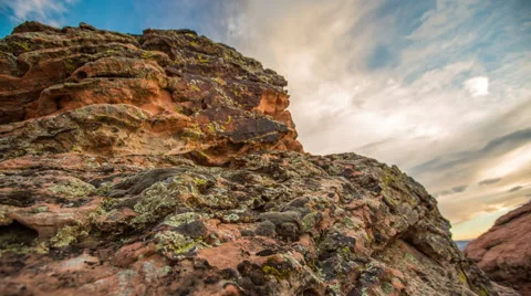 4K Time Lapse of Rocks with Moss and Clouds in the Background Stock Footage 42156990