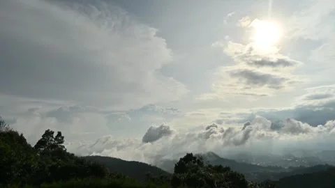 4K Time lapse of running clouds and sunset at doddabetta peak Stock Footage 286362055