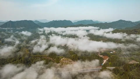 4K Time-lapse of Sea of Clouds Over Mountains After Spring Rain Video stock 342124250