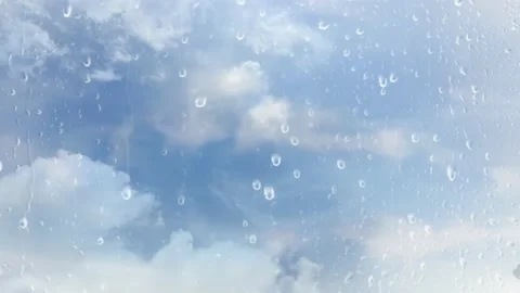 4k Time Lapse Sky and clouds after rain with water droplets on the glass Stock Footage 203950065