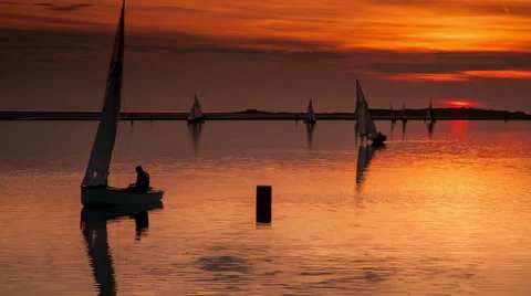 4k time lapse small yachts at sunset, West Kirby, Wirral, England Stock Footage