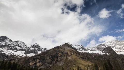 4K Time-Lapse of Snow mountains on blue sky at Yading national reserve. Stock Footage 88528722