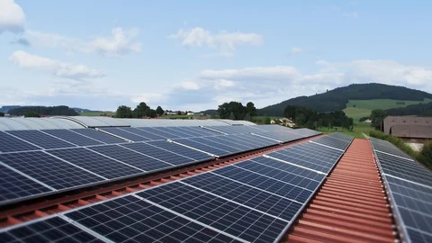 4K Time lapse of solar panels in clear day with passing clouds. 스톡 동영상 102557570