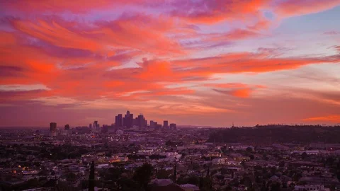 4K Time-Lapse of the spectacular red sunset over Los Angeles Downtown skyline Video stock 89486038