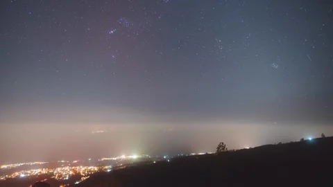 4K time-lapse of starry night sky with zodiacal light, Venus and rising clouds o Stock Footage 332932836
