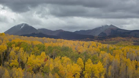 4K Time lapse of storm clouds and colorful Autumn trees in the La Sal Mountains 스톡 동영상 168108650