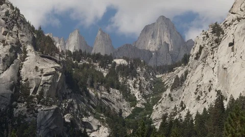4K Time lapse of summer clouds in blue sky casting shadows on Mount Whitney Stock Footage 79274457