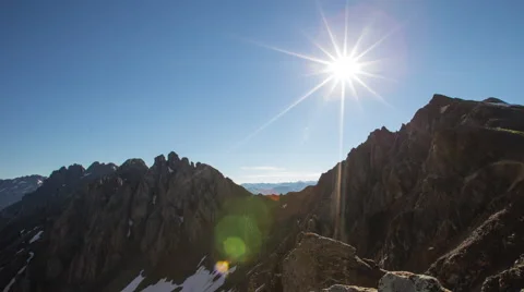4k time lapse sun rising over rocky mountains Stock Footage 40735167