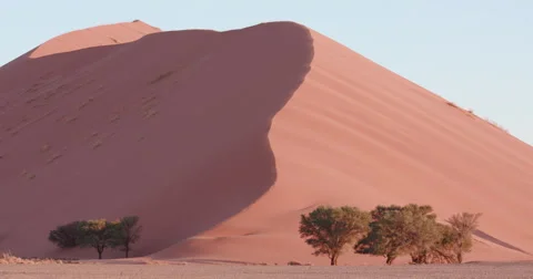 4K time lapse of sun setting on the sand dunes Stock-Footage 64698165