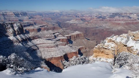 4K Time lapse of sunny cloud shadows on a snowy Grand Canyon National Park Stock Footage 121187670