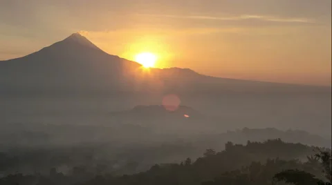 4k Time Lapse of sunrise over Merapi mountain and Borobudur temple Video stock 57315447