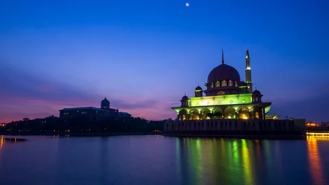 4K Time lapse of sunrise over Putra mosque in Putrajaya, Malaysia. Zoom In. Stock Footage 89706080
