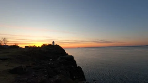 4k time lapse of sunrise over Aberdour lighthouse 库存影片 152207355