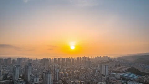 4K Time-lapse of Sunrise Over High-rise Buildings on City Skyline Stock Footage 342124411