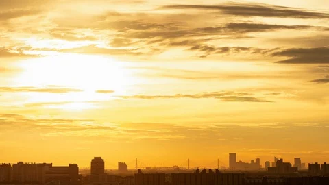 4K time lapse Sunset and beautiful fluffy storm cloudy yellow gold sky Stock Footage 95189265
