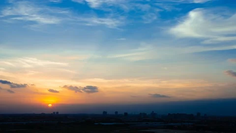 4K Time lapse sunset and beautiful twilight fluffy storm cloudy Stock Footage 100188893