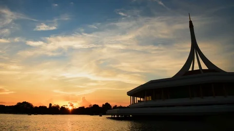 4K Time lapse sunset and cloudy blue and yellow sky smoothly flowing Stock Footage 107391370