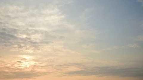 4K Time lapse sunset and cloudy blue and yellow sky smoothly flowing Stock Footage 108248220
