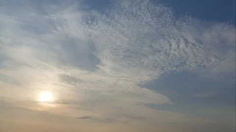 4K Time lapse sunset and cloudy blue and yellow sky smoothly flowing Video stock 108248280