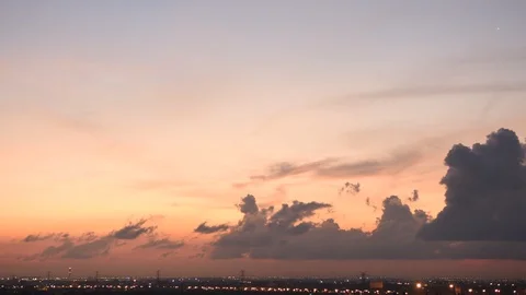 4K Time lapse sunset and cloudy blue and yellow sky smoothly flowing Stock Footage 108248792