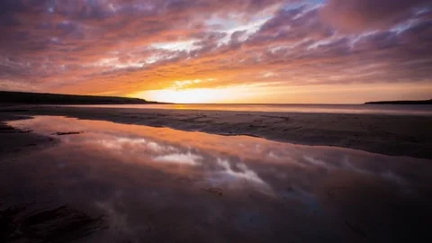 4k Time Lapse of Sunset and Cross winds at Skaill Beach in Sandwick Orkney Stock-Footage 253321702