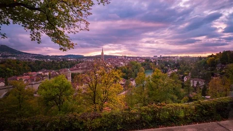 4K time lapse at sunset in Bern, Switzerland overlooking mountains and river Stock Footage 81139660
