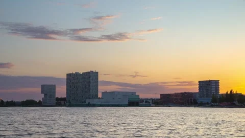 4K Time-lapse, sunset city skyline at waterfront, Almere, Flevoland, Netherlands Video stock 244845456
