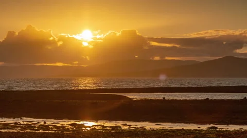 4K time lapse of sunset with clouds at Largs on the west coast of Scotland Stock Footage 156707974