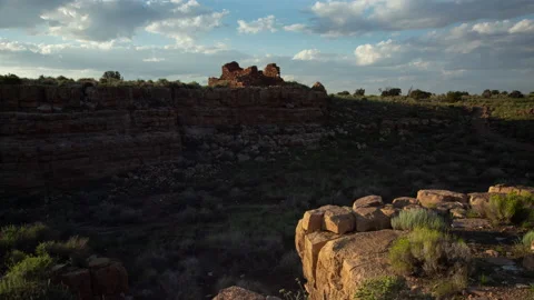 4K Time Lapse Of Sunset Clouds and cliff top Ruins in The Box Canyon Pueblo Stock Footage 159521259