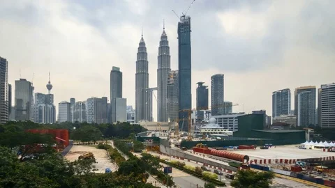 4k time lapse of sunset day to night at Kuala Lumpur city. Moving vehicles an Stock Footage