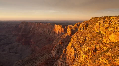 4K Time lapse of sunset light illuminating Grand Canyon cliffs fading to dusk Stock Footage 150005155