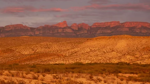 4K Time lapse of sunset light illuminating Sierra del Carmen ridge in Big Bend Stock Footage 166485921
