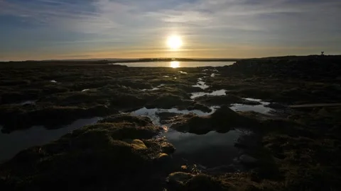 4k time lapse sunset at the loch of the tarf on  Swona in Orkney Video stock 297771089