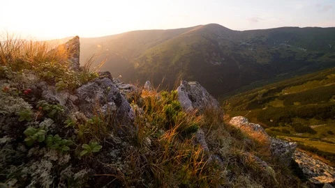 4K Time Lapse Of Sunset, Mountain Ridge And Stones In Foreground Stock Footage 123466455