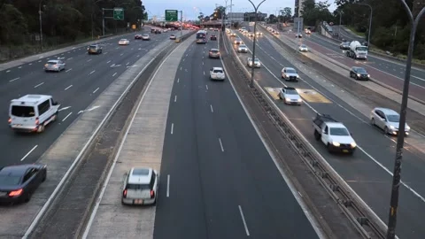 4k time lapse at sunset in North Sydney over multi-lane Motorway 1 rush hour. Stock Footage 134875062