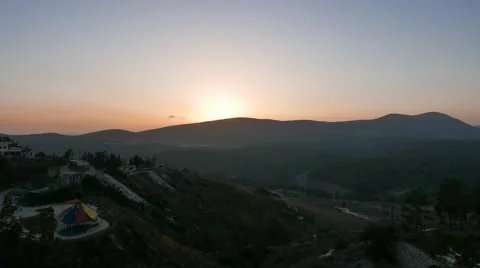 4k Time-lapse of Sunset Over Mountains with Wispy Clouds and Angel Dust Effect Stock Footage 56500822