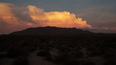 4K time lapse of a sunset summer thunderstorm in Joshua Tree National Park Stock Footage 204760404