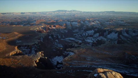 4K Time lapse of sunset sunlight and shadows in snowy Canyonlands National Park Stock Footage 168107965