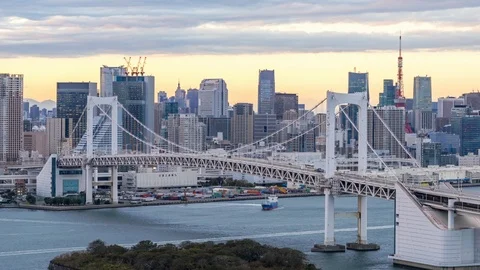 4k Time lapse Sunset of Tokyo City Skyline at Odaiba Tokyo Bridge,Japan Stock Footage 121645538