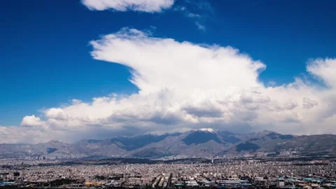 4K Time lapse of Tehran cityscape, clouds moving over highest Tehran mountain Stock-Footage 276250668