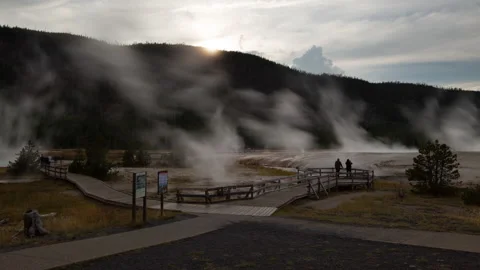 4K Time Lapse of tourists at the Black Sand Basin Geysers in Yellowstone Park Stock Footage 215550486