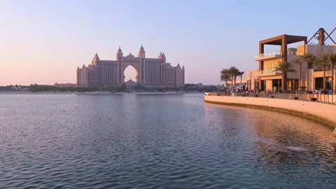 4K Time lapse of  tourists in The Pointe during sunset with Atlantis view Stock Footage 146799630