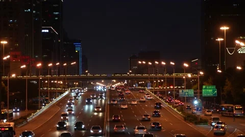 4K time-lapse of the traffic flow of the Guomao Bridge at night Stock Footage 207677416